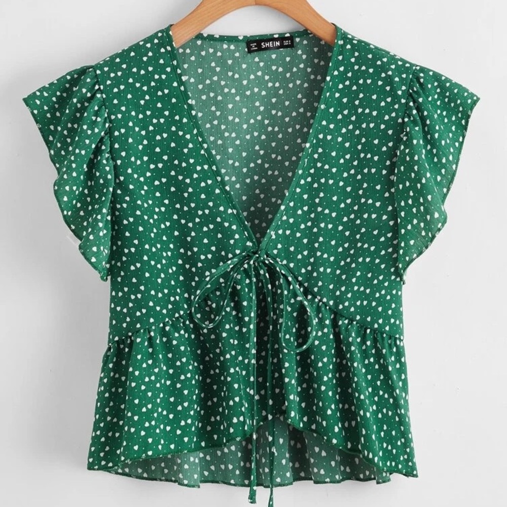 Peplum ruffled top